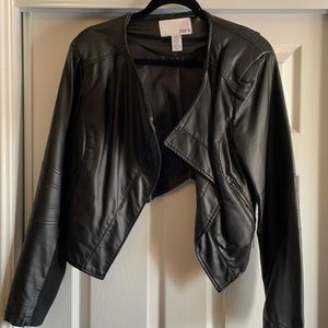 Faux leather cropped jacket. Dress up or down.
